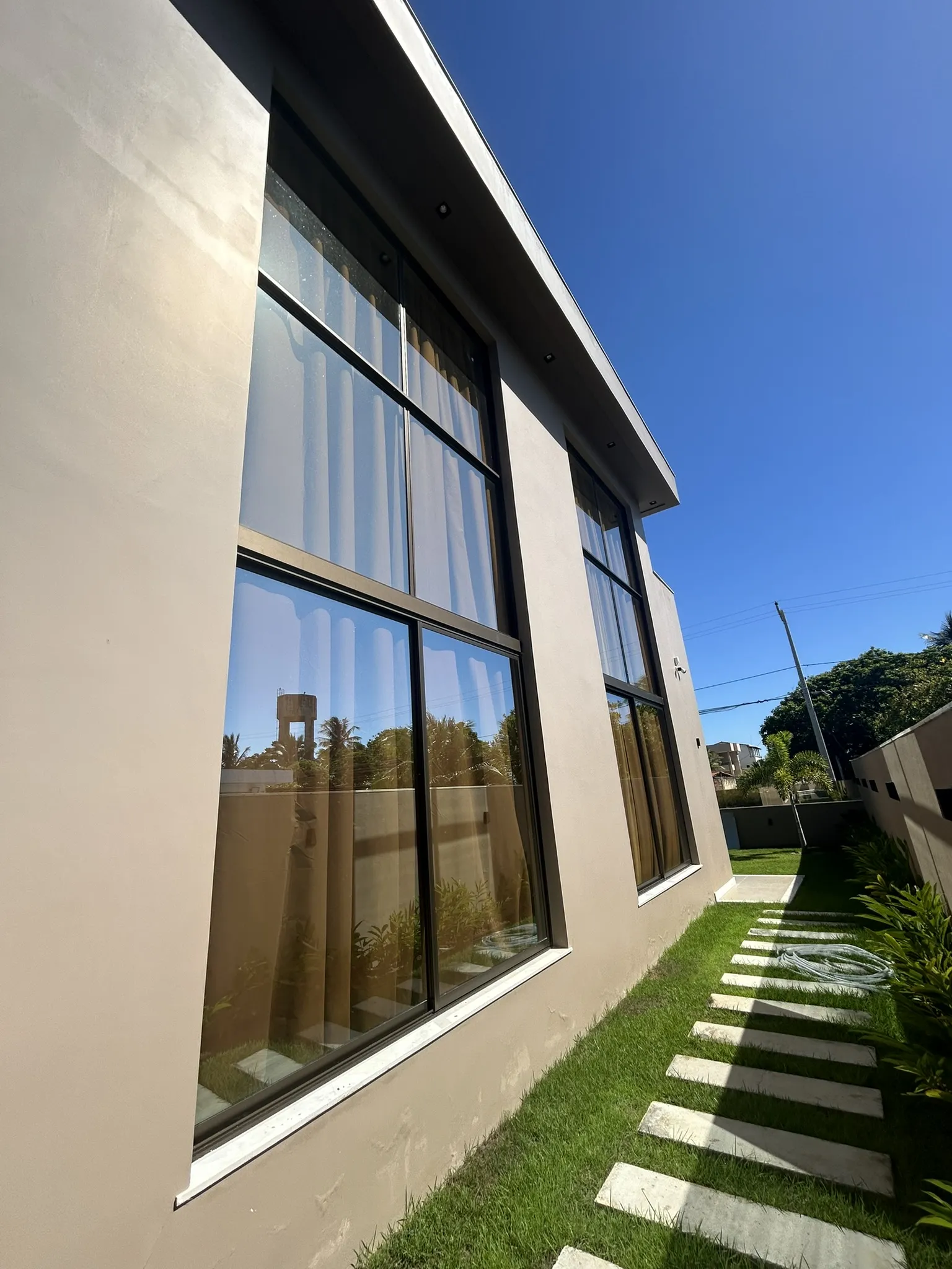 Imagem ilustrativa de Pele de vidro fachada residencial preço